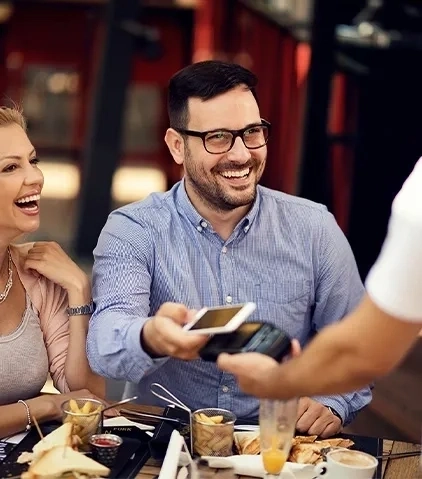 Payment by phone in a restaurant